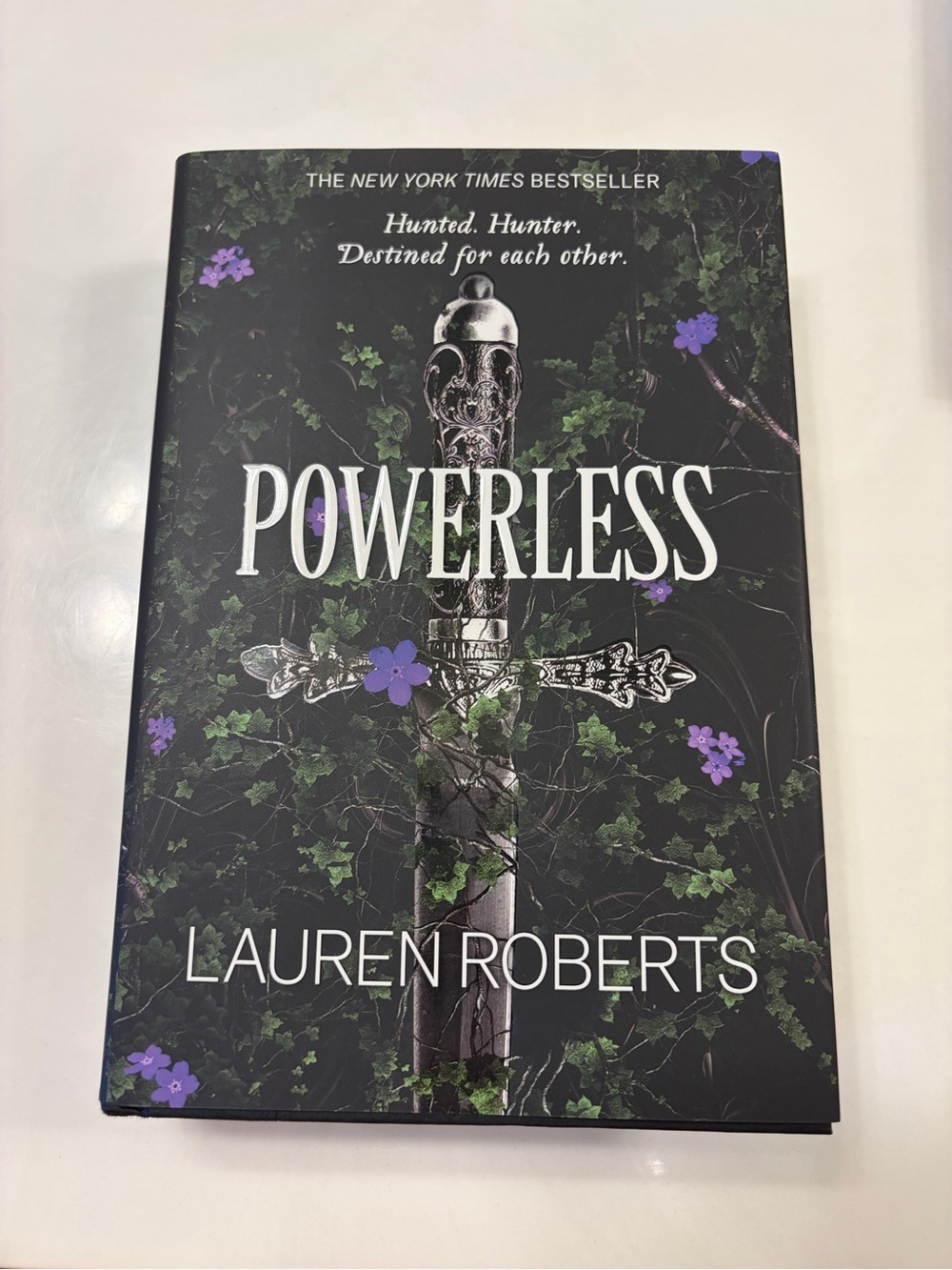 Powerless by Lauren Roberts - Hardcover Book in Black & Purple